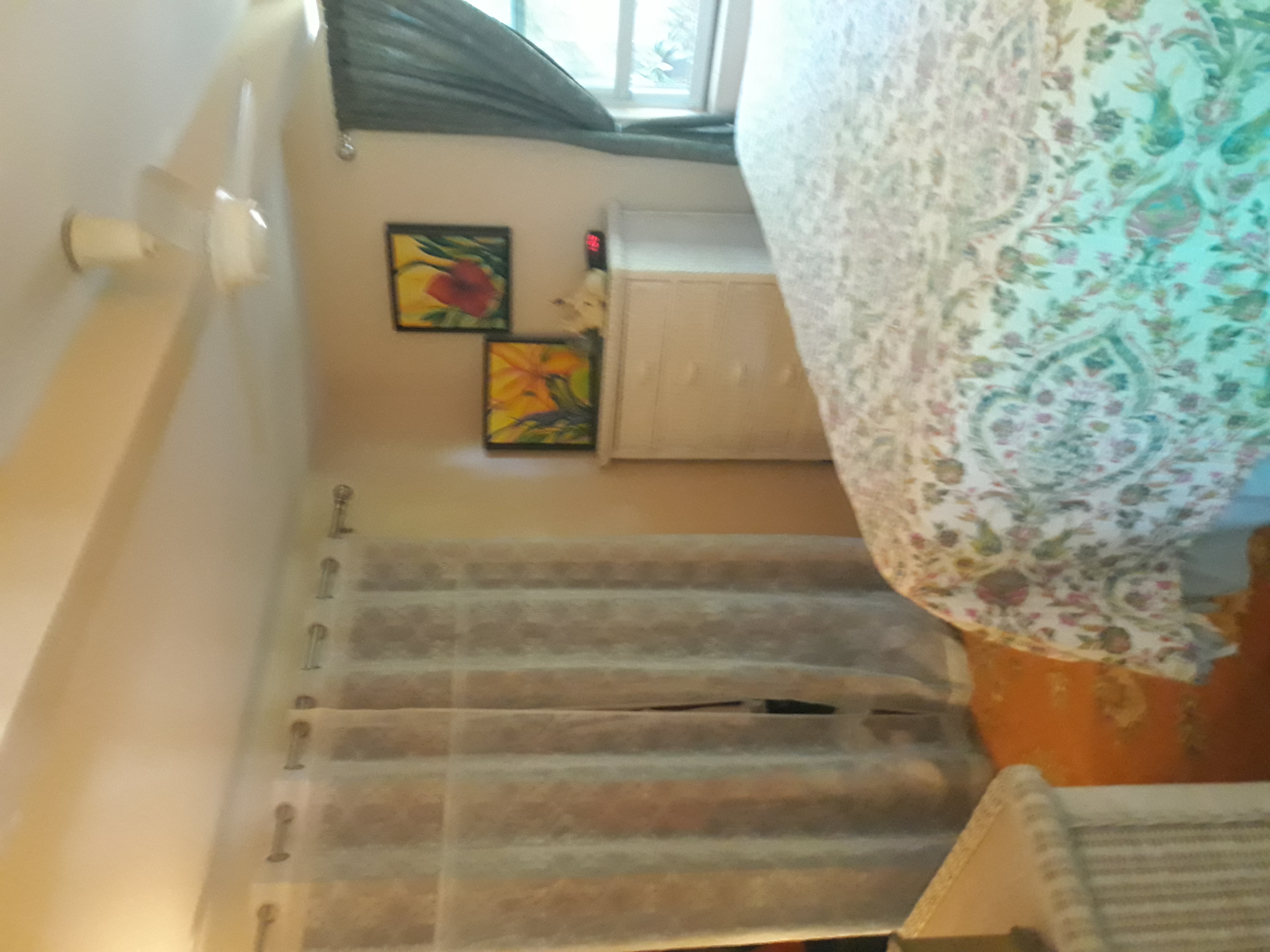 Both a wicker bureau and dresser.